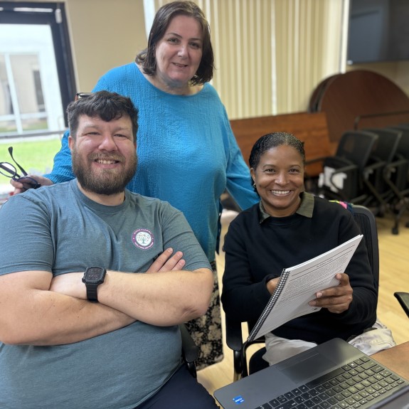 3 people at a training